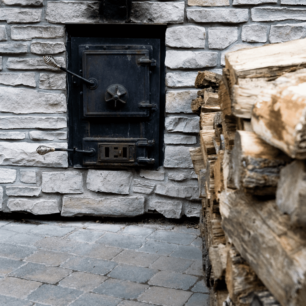 Cleaning soot from a wood burning stove