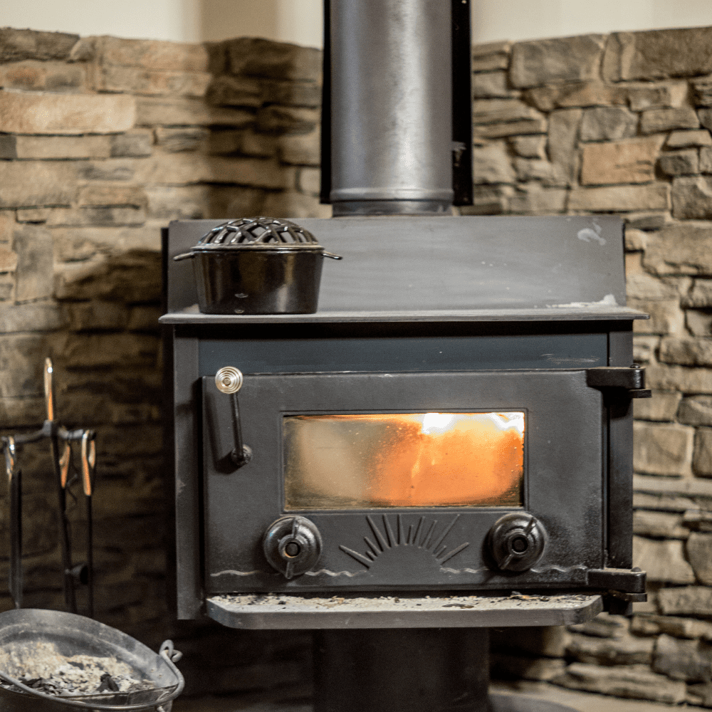 Wood burning stove cleaning window